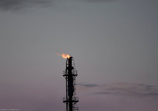 Flaming tower at sunset